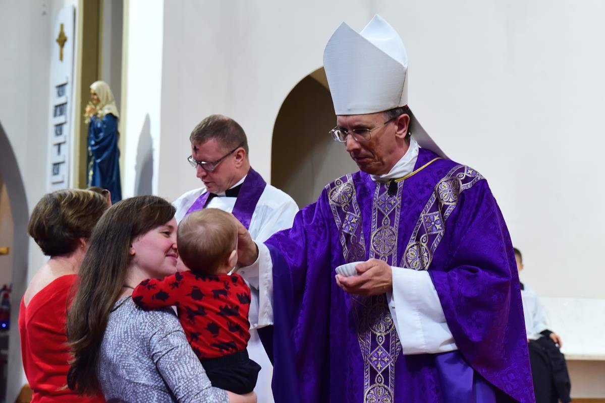 CHARLOTTE — Bishop Peter Jugis celebrated Mass on Ash Wednesday at St. Patrick Cathedral. (Photos by James Sarkis)