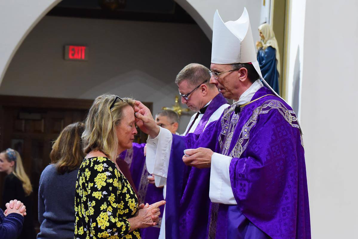 CHARLOTTE — Bishop Peter Jugis celebrated Mass on Ash Wednesday at St. Patrick Cathedral. (Photos by James Sarkis)