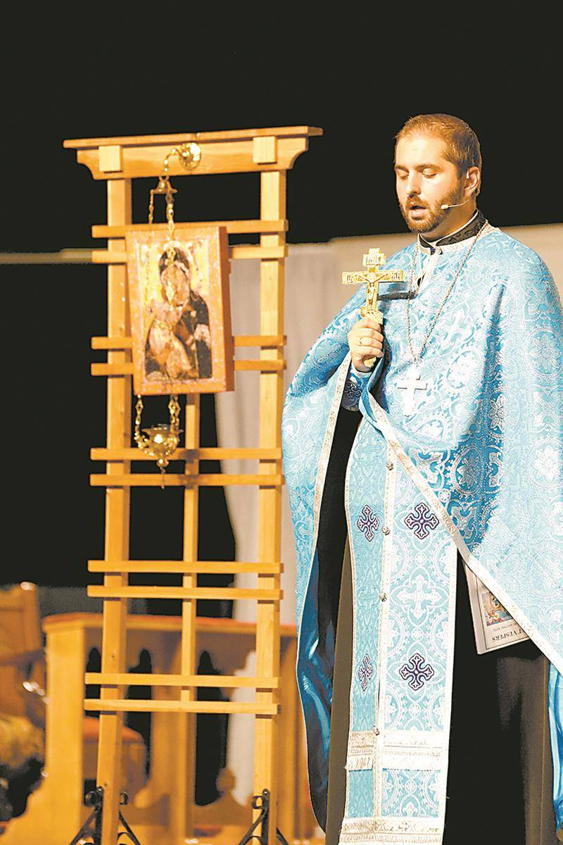 Father Matlak chants Byzantine Rite Vespers during the 2018 Eucharistic Congress.