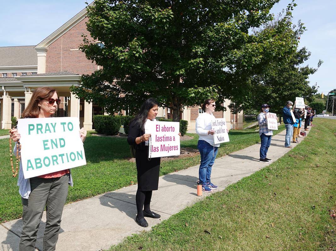 St. Mark Church’s Life Chain was held on Sunday, Oct. 4. Nearly 250 people came to silently pray along the sidewalk that spans from St. Mark Church to St. Mark School. (Photos provided by Amy Burger)