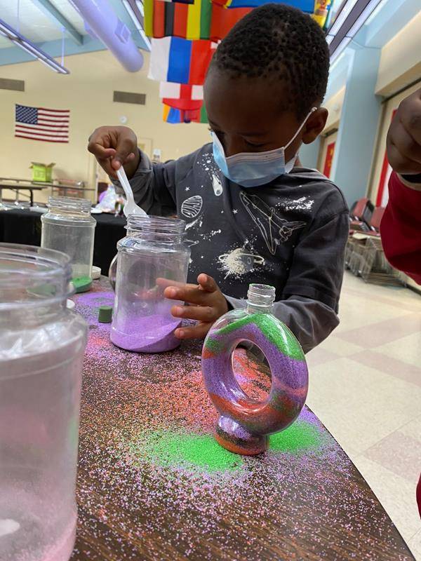 Susan Adams of Artyfacts donated craft supplies and great art project ideas for the young campers. The children had fun making sand art and decorated Chinese lanterns.