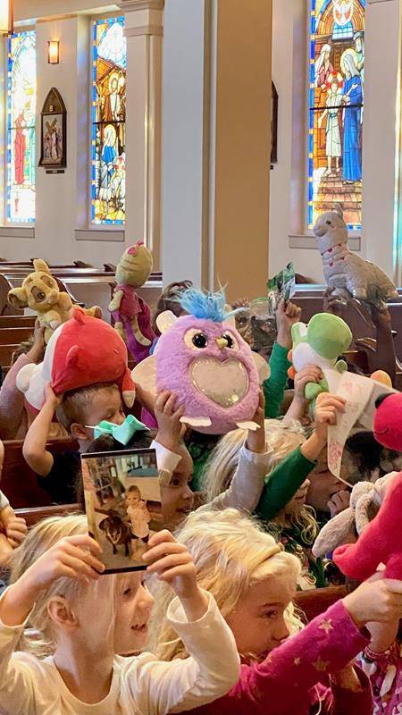 St. Mark Church preschoolers brought stuffed animals and pictures of their pets to be blessed.